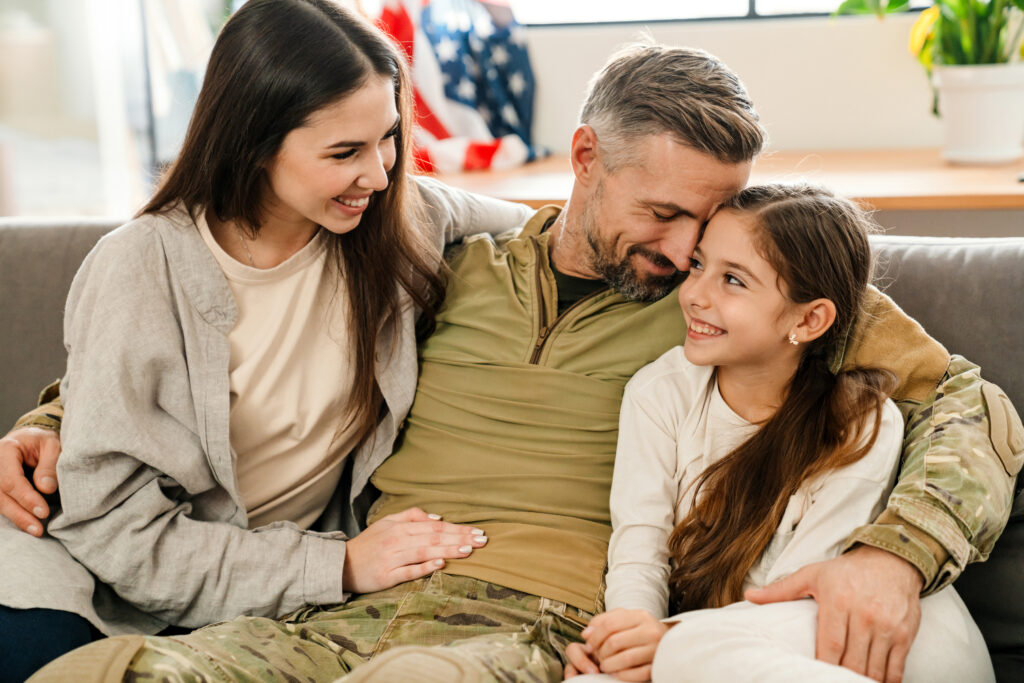 happy masculine military man hugging his family wh 2023 11 27 04 52 43 utc After Action an AM Health Care Program