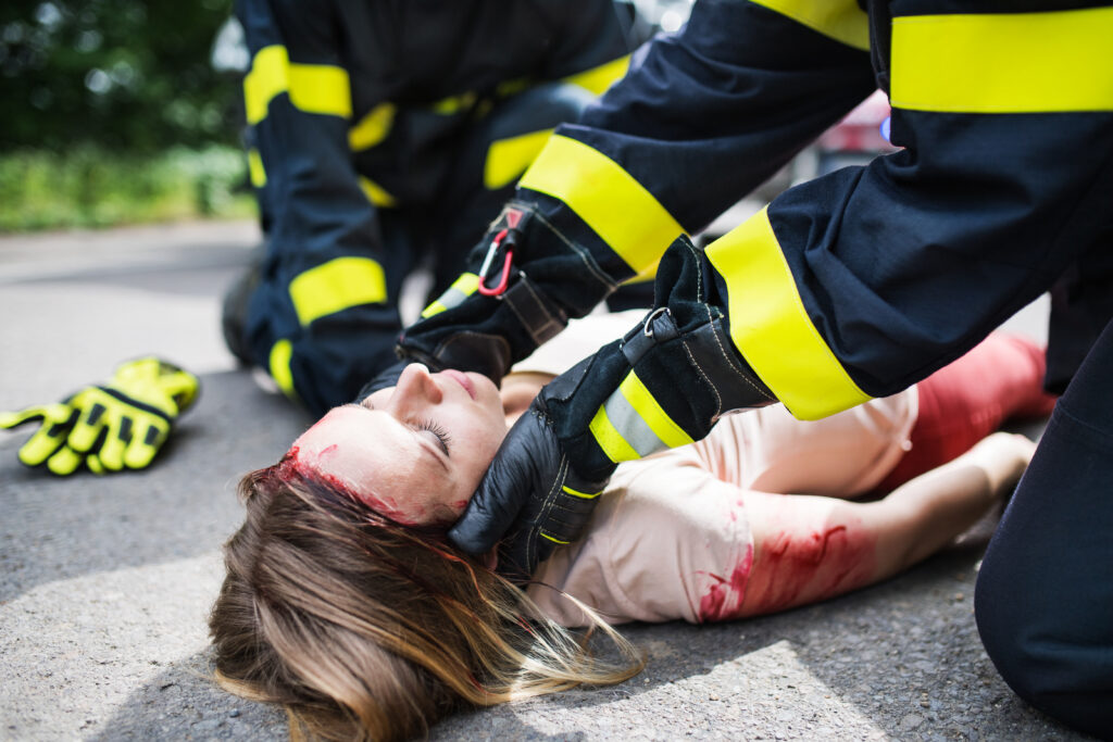 unrecognizable firefighters helping a young injure 2023 11 27 05 33 44 utc 1 After Action an AM Health Care Program