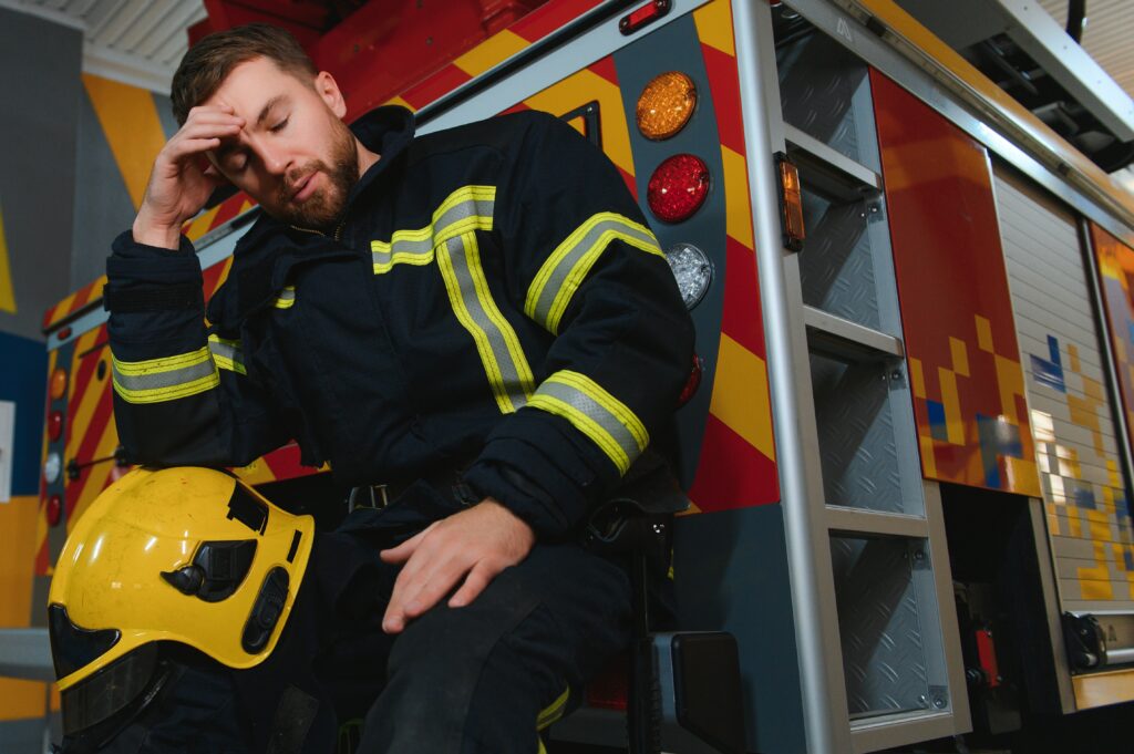 a seated and sweating firefighter is exhausted di 2024 02 14 18 23 15 utc After Action an AM Health Care Program