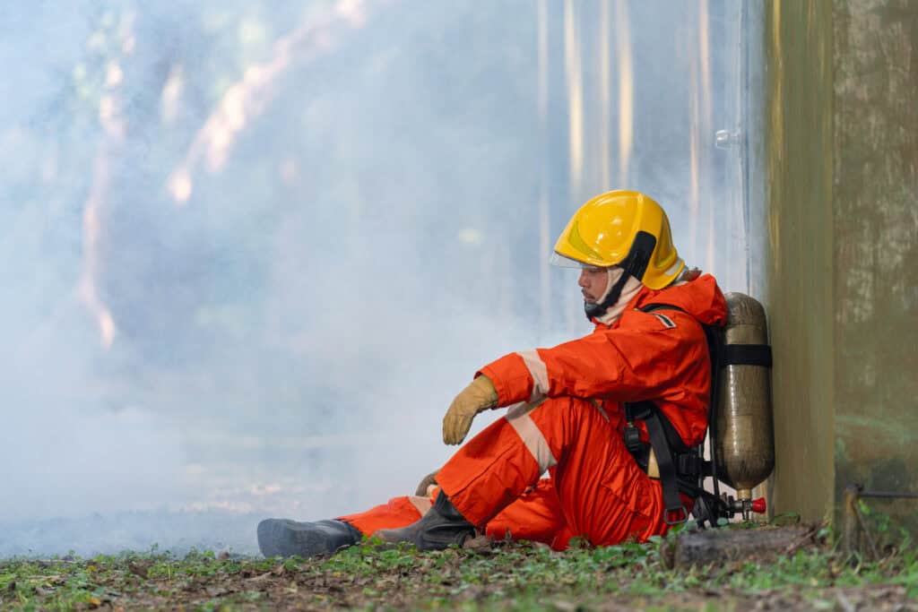 First responder mental health: firefighter decompressing post-shift.