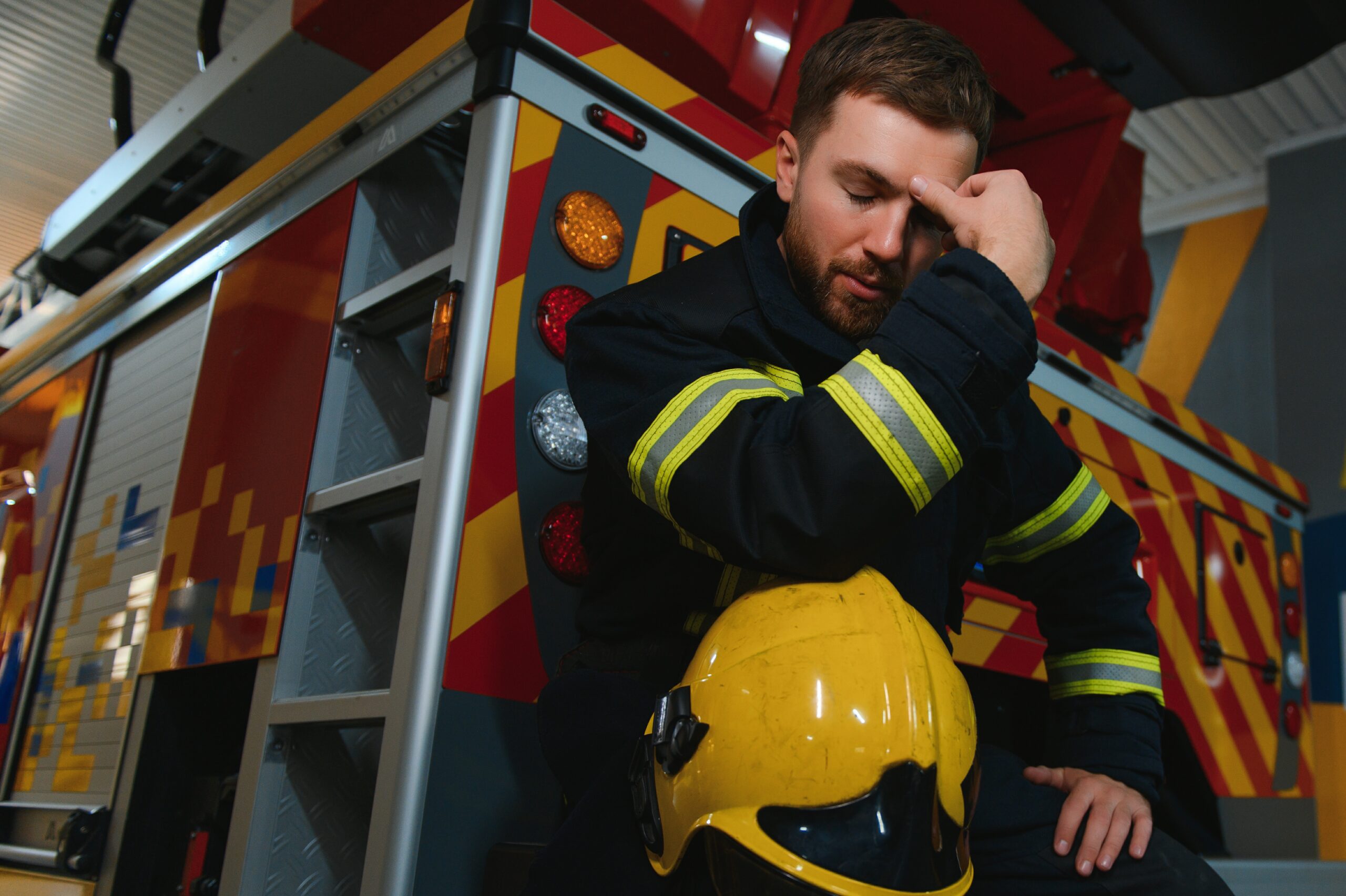 Exhausted firefighter experiencing shift work sleep disorder after a night shift